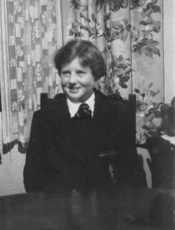 Margaret in her new school uniform, the night before starting at Hampton High, circa 1952.